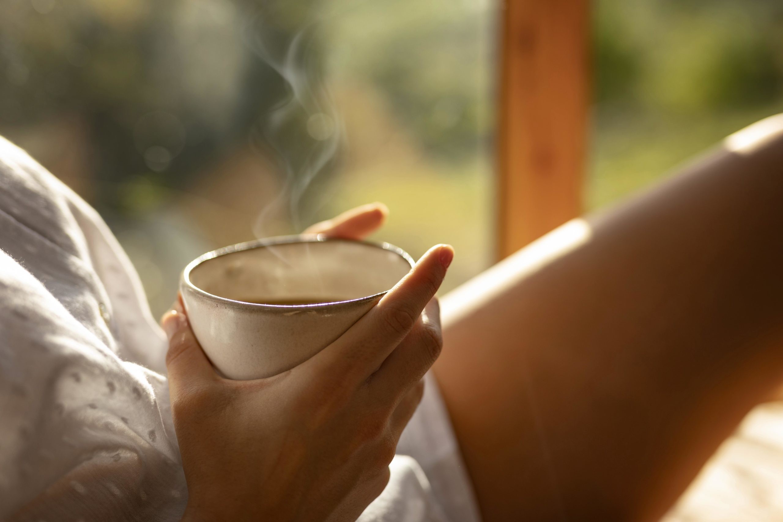hands-holding-coffee-cup-close-up